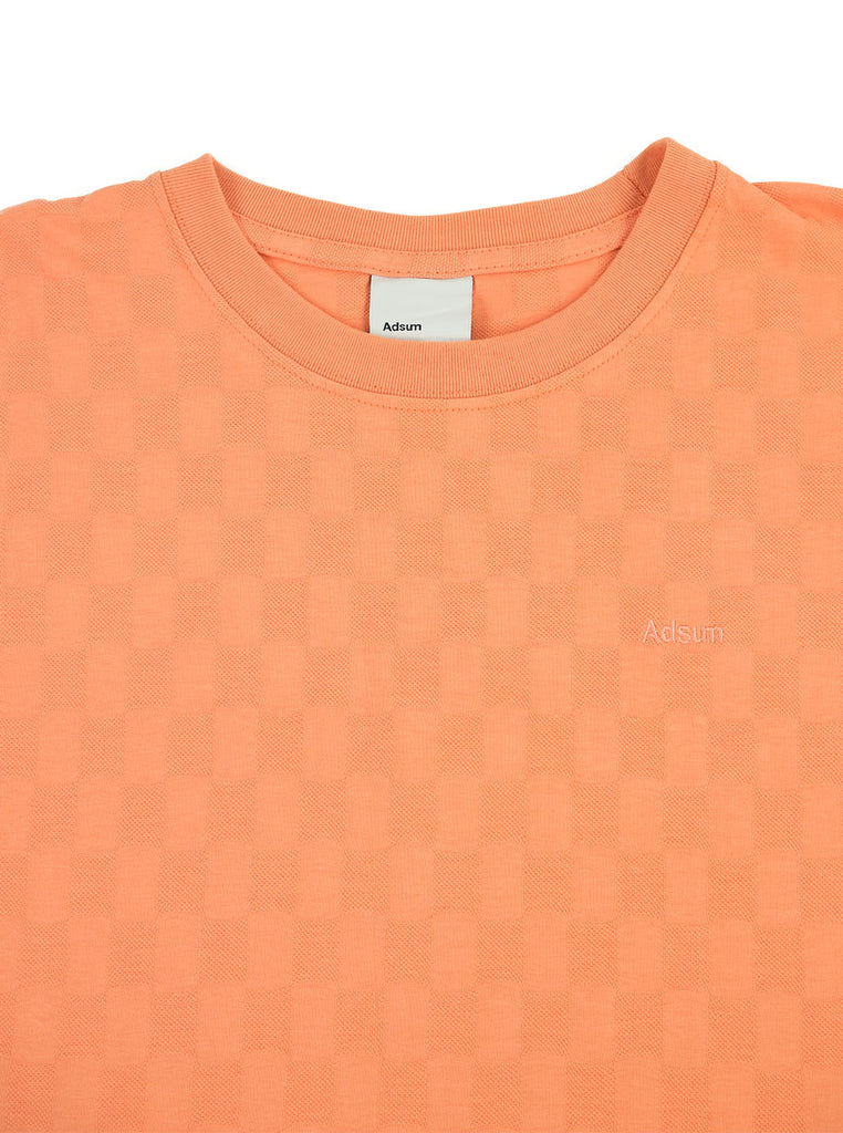 Adsum Jacquard Check Pique Tee Sherbert The Northern Fells Clothing Company Neck